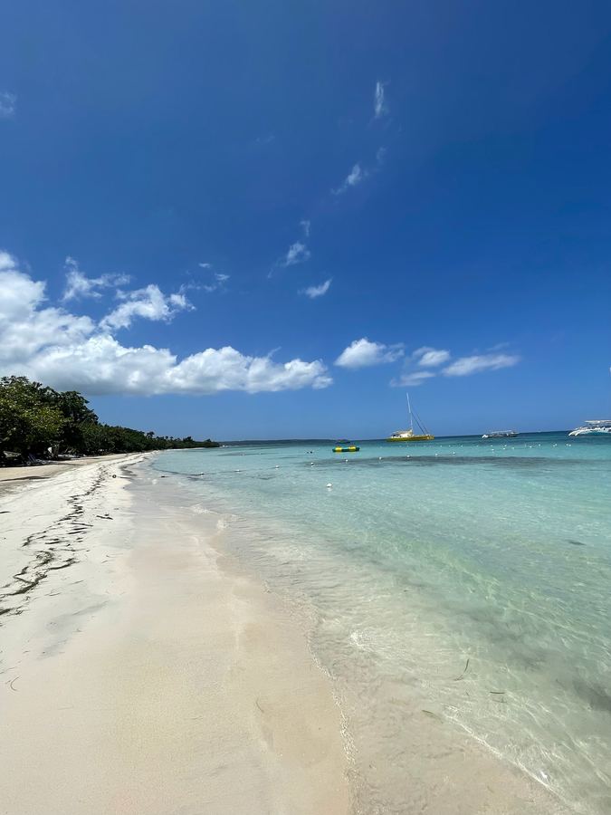 A quiet white-sand beach and clear water